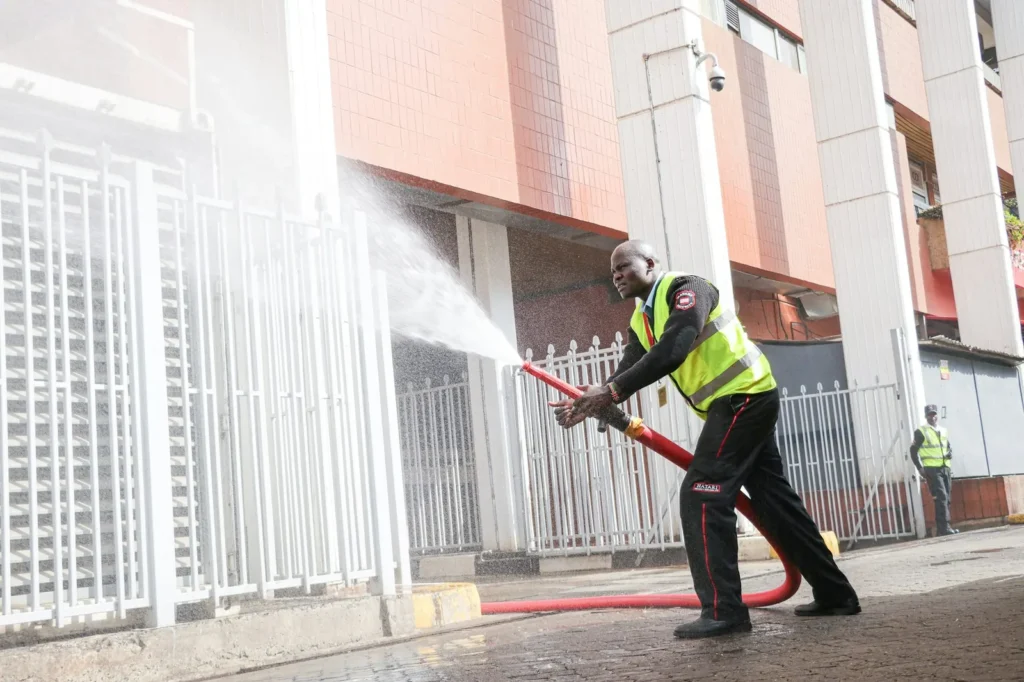 Pressure washing a building entrance